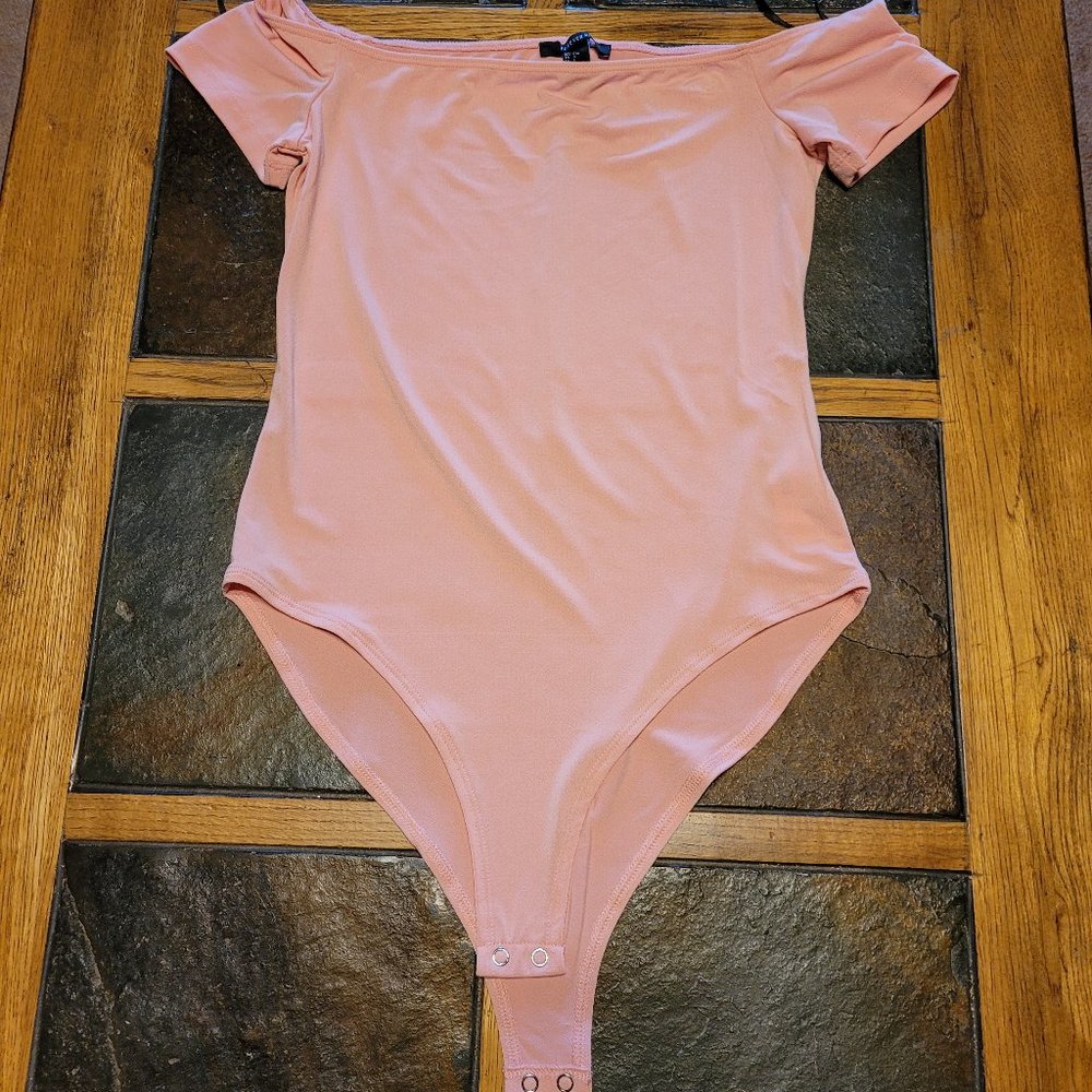 Light pink body suit